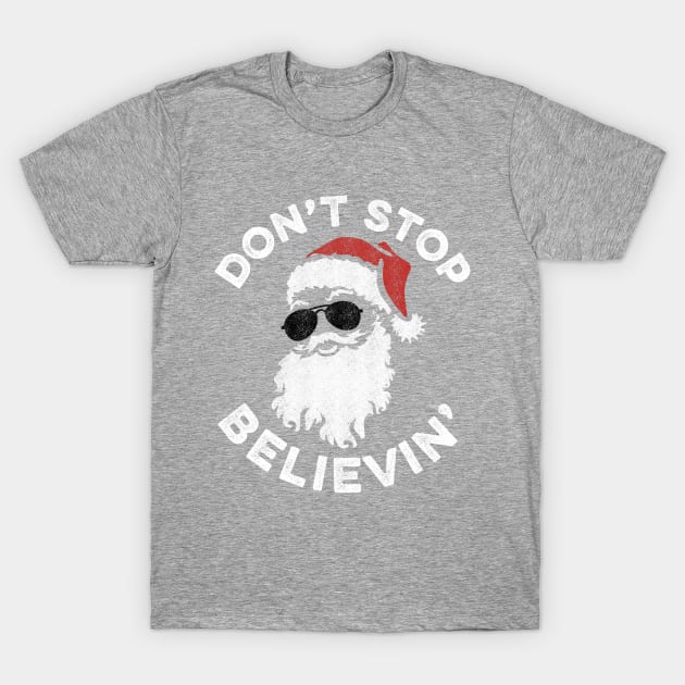 Santa Don't Stop Believin' T-Shirt by Tingsy